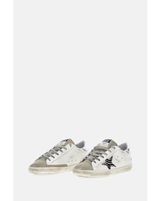 Sneaker Super Star di Golden Goose Deluxe Brand in White