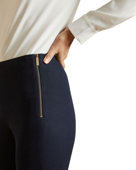 blue ankle grazer trousers