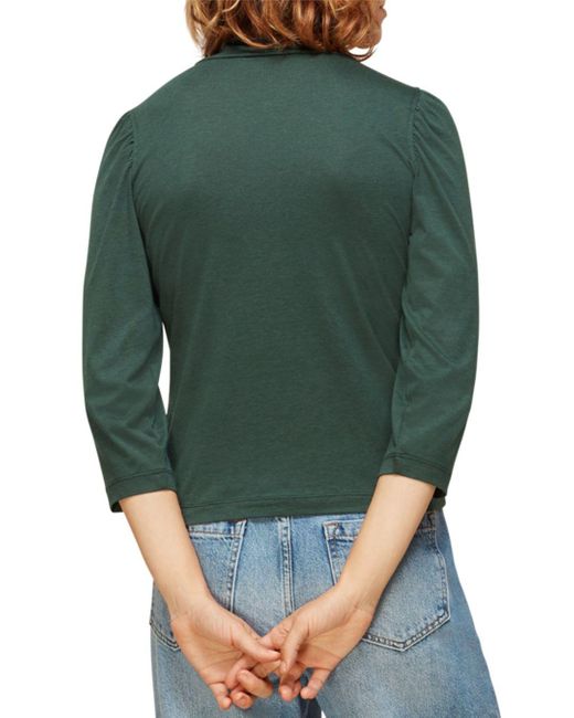 dark green mock neck top