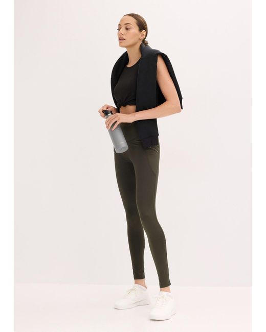 Leggings Termici Con Dettagli Riflettenti E Tasca Per Il Cellulare di bonprix in Green
