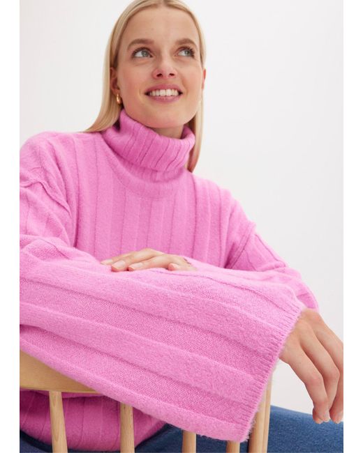 Maglione A Collo Alto A Coste di bonprix in Pink