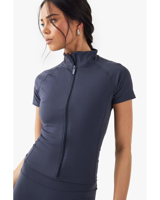 DSGN Studio Blue Ultra Sculpt Zip Through Short Sleeve Top