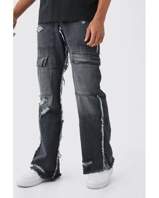 BoohooMAN Black Relaxed Rigid Flare Frayed Edge Cargo Jeans for men