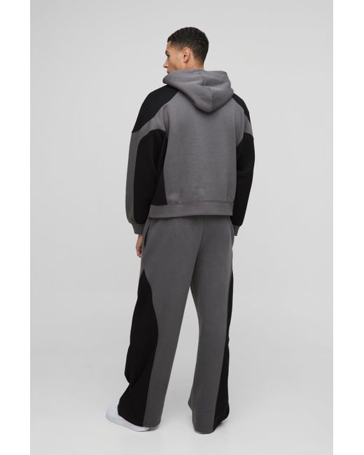 BoohooMAN Kastiger Oversize Man Trainingsanzug mit Naht-Detail und Kapuze in Black für Herren