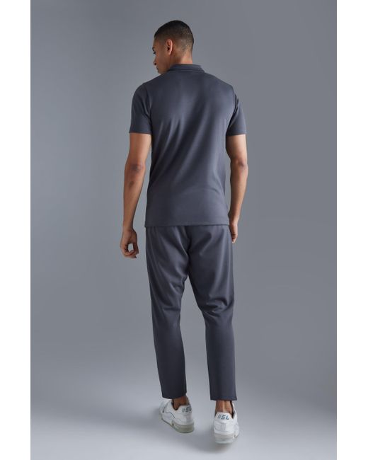BoohooMAN Kurzärmliges Slim-Fit Colorblock Poloshirt mit 1/4 Reißverschluss in Gray für Herren