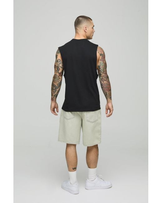 Camiseta Sin Mangas Oversize Con Sisa Ancha Y Estampado De Guns N Roses Boohoo de color Black