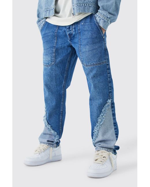 BoohooMAN Relaxed Rigid Frayed Spliced Jeans In Mid Blue for men