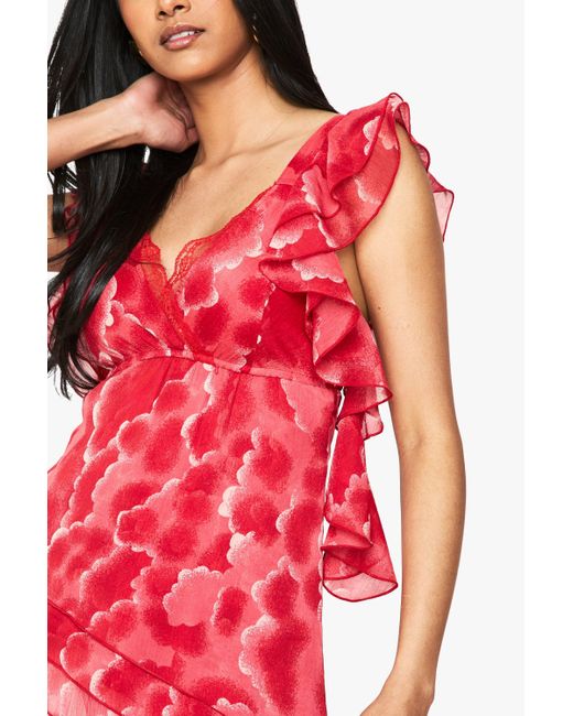 Blusa De Chifón Asimétrica Con Volante Y Estampado De Flores Boohoo de color Red