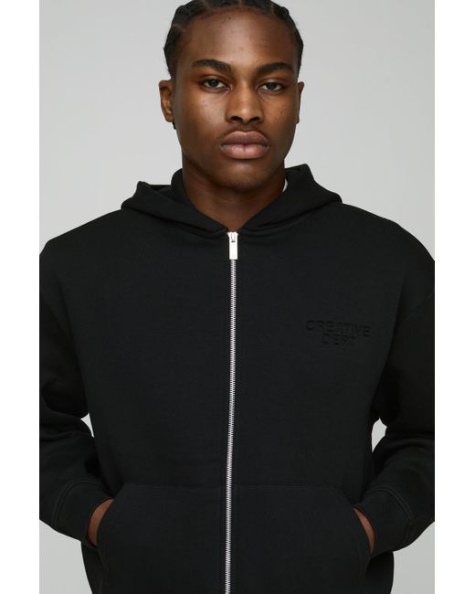 BoohooMAN Kastiger Oversize Trainingsanzug mit Creative Dept Print und Reißverschluss in Black für Herren