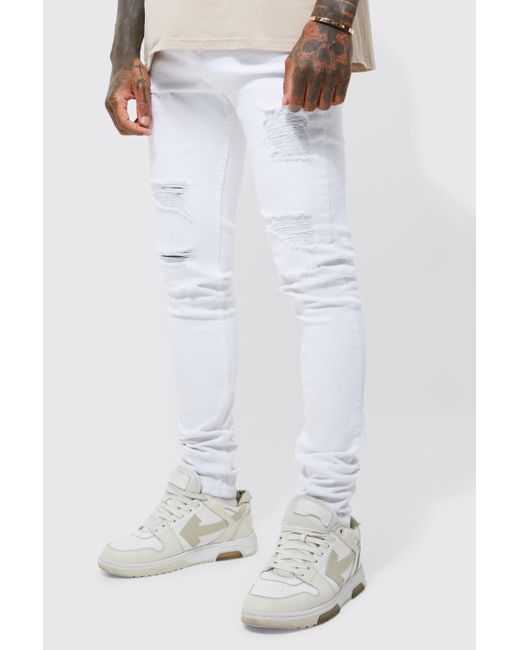BoohooMAN Tall Super Skinny Jeans With All Over Rips in White for Men | Lyst