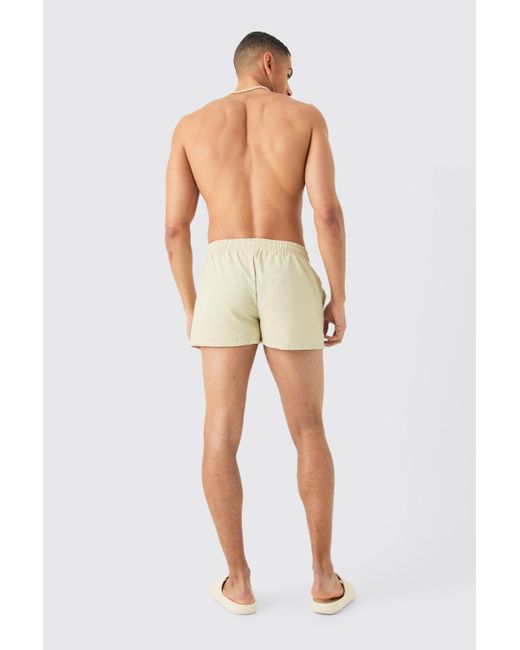 BoohooMAN Natural Super Short Plain Crinkle Swim Short for men