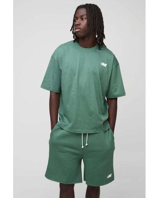 Conjunto Oversize Recto De Pantalón Corto Y Camiseta Con Caída En La Entrepierna Y Estampado De Llamas M Boohoo de color Green