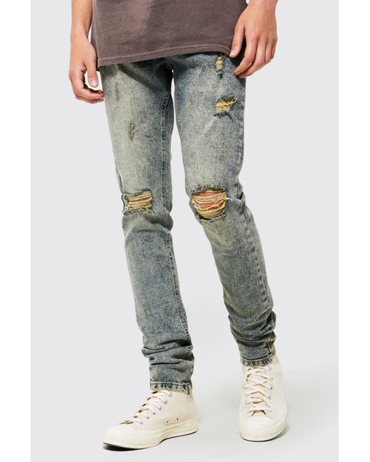 Boohoo Denim Super Skinny Stacked Busted Knee Jeans in Blue | Lyst