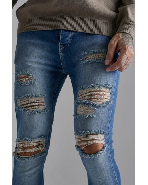 BoohooMAN Skinny Skinny Jeans mit Rissen in Blau für Herren | Lyst DE