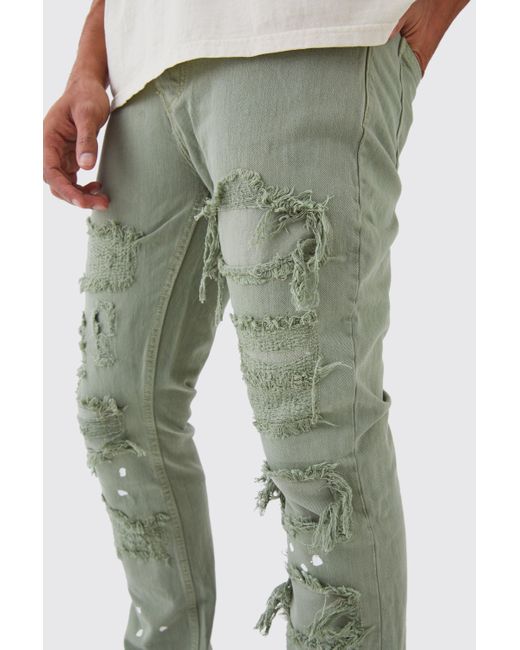 BoohooMAN Green Slim Rigid Flare Rip & Repair Bleached Jeans for men