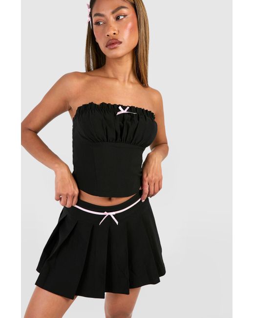 Pleated Bow Detail Micro Mini Skirt Boohoo de color Black