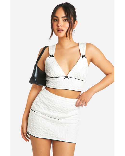 Textured Bow Detail Mini Skirt Boohoo de color White