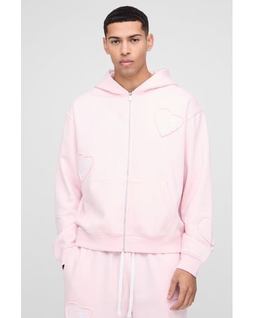 Chándal Oversize Recto Con Cremallera Y Pernera Ancha Con Aplique De Corazones Boohoo de color Pink