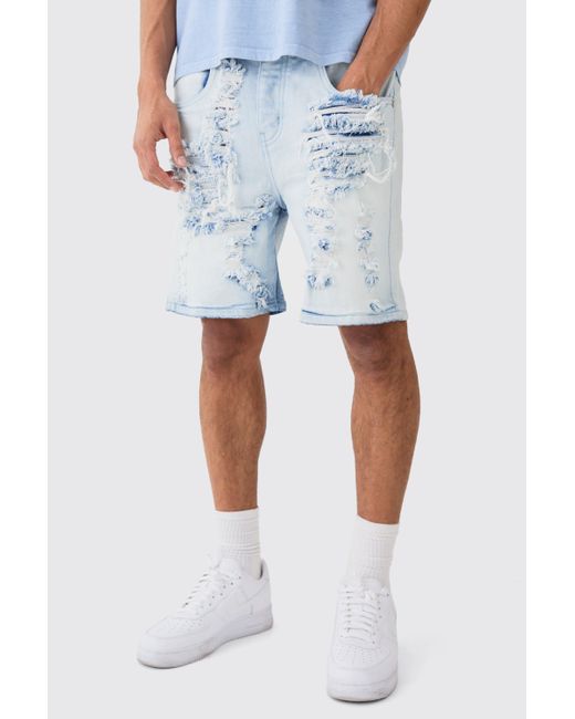 BoohooMAN Relaxed Rigid Extreme Rip & Repair Denim Short In Ice Blue for men