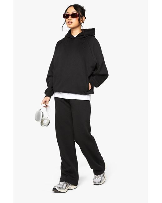 Pantalón Deportivo Recto Minimalista Con Cintura Elástica Boohoo de color Black
