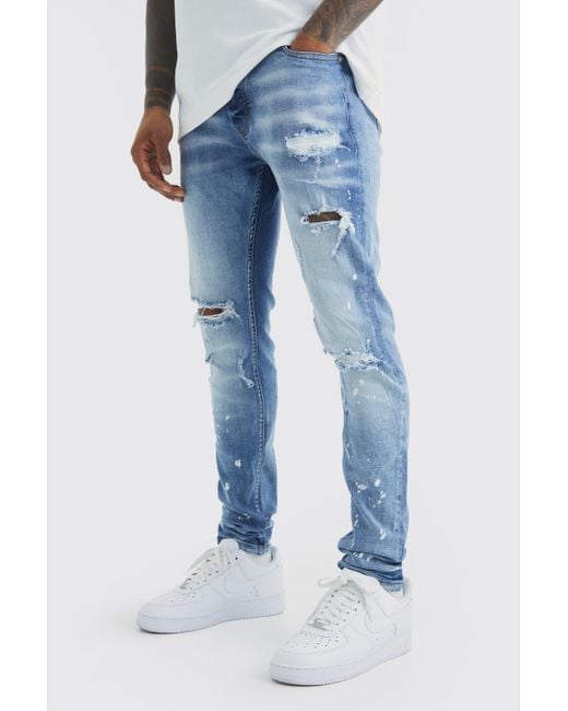 BoohooMAN Blue Skinny Stretch Bleached Ripped Knee Jeans for men