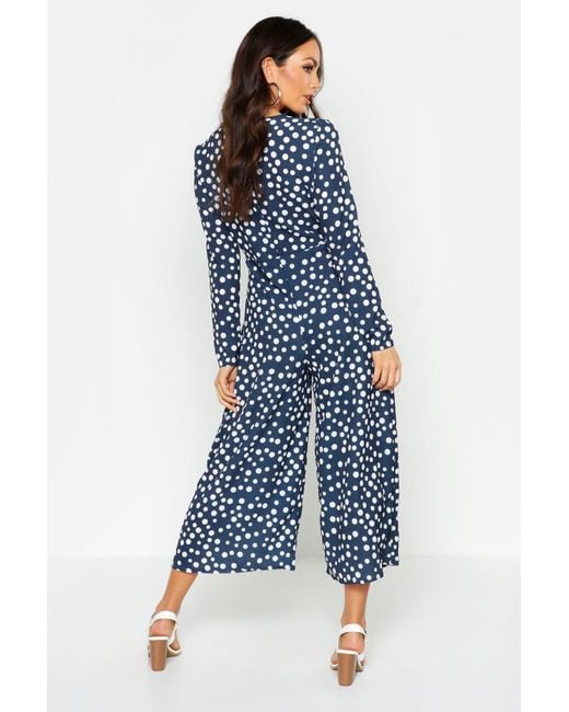 Boohoo Synthetic Twist Front Polka Dot Jumpsuit In Navy Blue Lyst