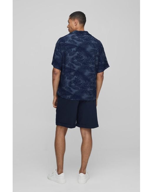 BoohooMAN Kastiges Oversize Poloshirt mit Palmen-Print in Blue für Herren