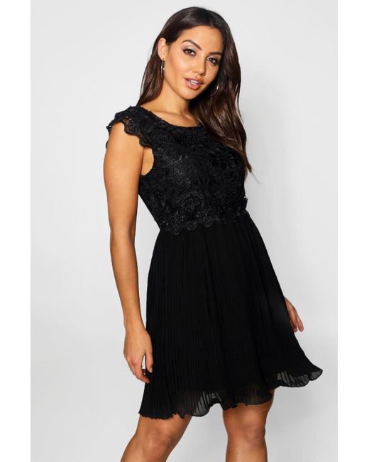 black pleated skater dress