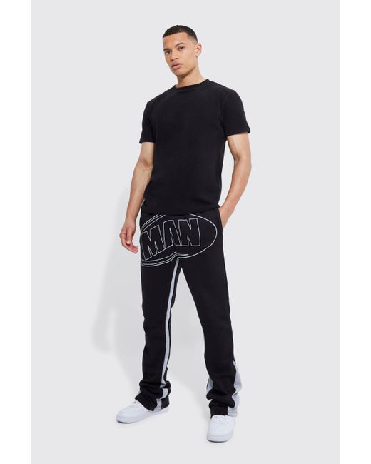 stacked black joggers