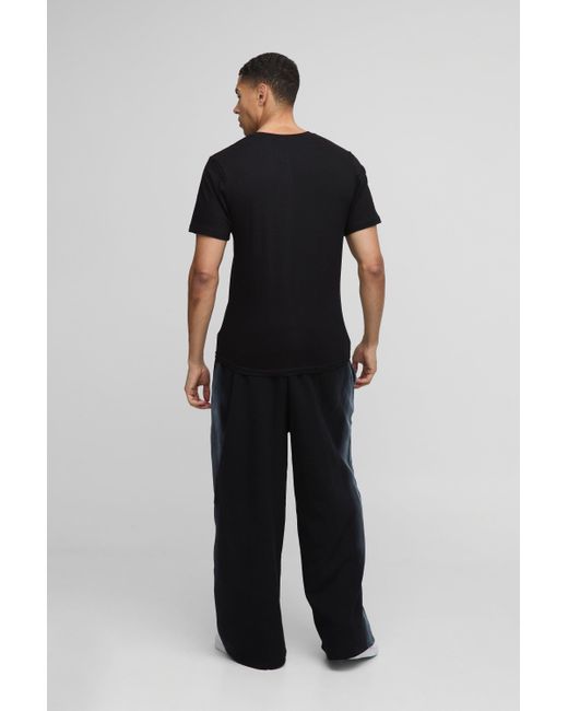 BoohooMAN Jogginghose mit weitem Bein und Naht-Detail in Black für Herren