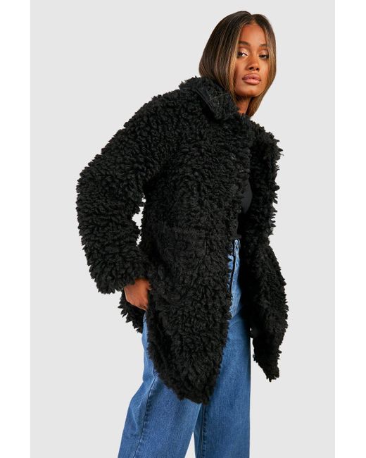 Black textured faux fur coat 2025