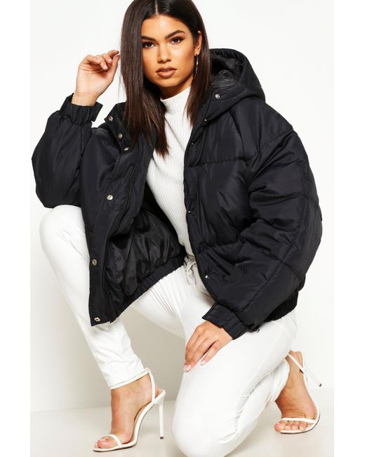black oversized puffer coat