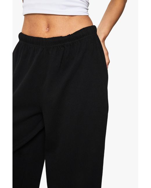 Pantalón Tall De Canalé Recto Con Estampado Boohoo de color Black