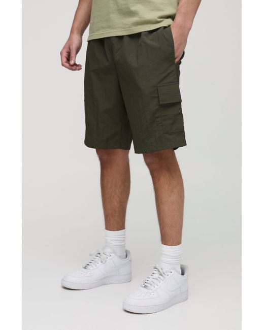 BoohooMAN Green Elasticated Waist Relaxed Mid Length Crinkle Nylon Cargo Shorts for men