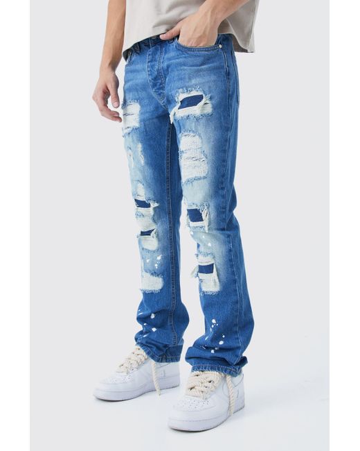 BoohooMAN Blue Slim Rigid Flare Rip & Repair Bleached Jeans for men