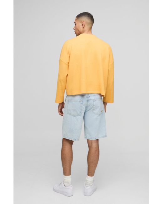 BoohooMAN Langärmliges kastiges Oversize Oberteil in Waffeloptik mit Knöpfen in Orange für Herren
