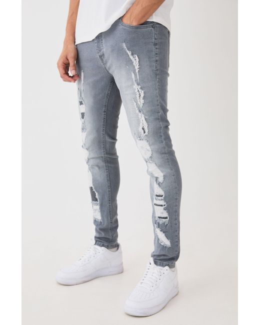 BoohooMAN Blue Skinny Stretch All Over Ripped Grey Jeans for men