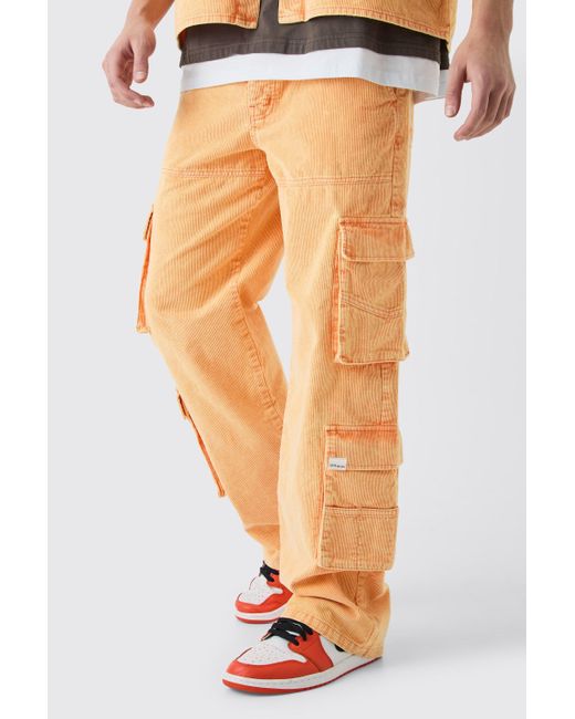 BoohooMAN Baggy Multi Pocket Acid Wash Cord Pants In Orange for men