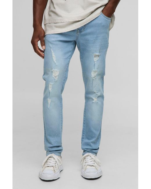BoohooMAN Blue Skinny Fit Rhinestone Washed Rip & Repair Jeans for men