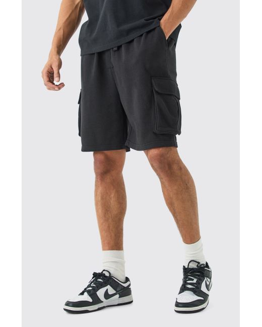 BoohooMAN Oversized Drop Crotch Cargo Pocket Jersey Shorts in Black für Herren