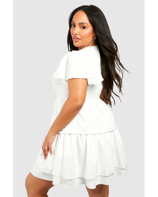 Plus Woven Textured Ruffle Skater Dress Boohoo de color White