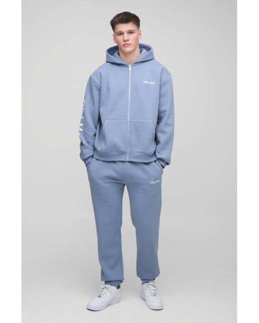 BoohooMAN Tall kastiger Official Man Trainingsanzug mit Reißverschluss und Kapuze in Blue für Herren