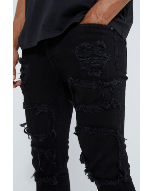 BoohooMAN Black Skinny Stacked Distressed Ripped Jeans for men