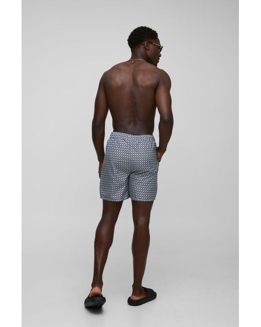 BoohooMAN Blue Abstract Printed Mid Length Swim Trunks for men
