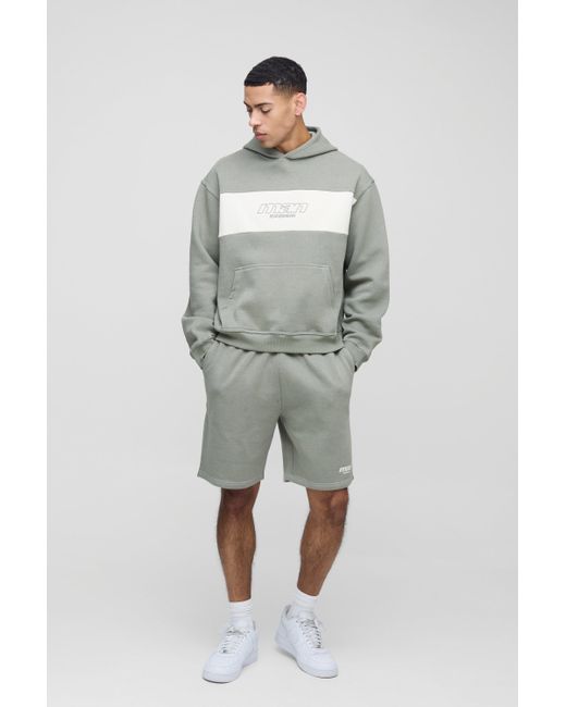 Chándal Oversize Man Recto De Pantalón Corto Y Sudadera Con Capucha Y Colores En Bloque Boohoo de color Gray