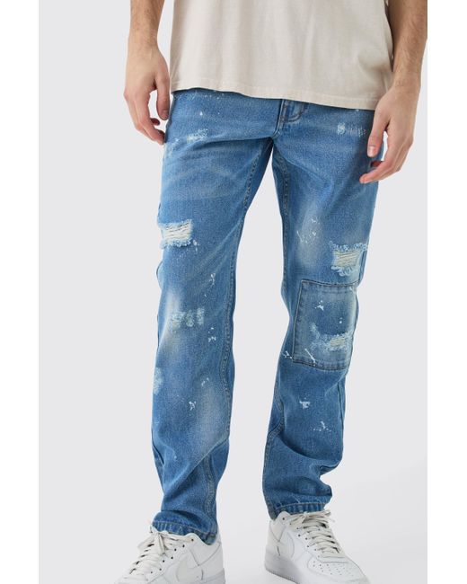 BoohooMAN Blue Slim Rigid All Over Paint Detail Knee Ripped Jeans for men
