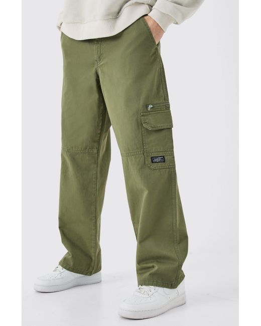 BoohooMAN Green Fixed Waist Cargo Zip Pants With Woven Tab for men