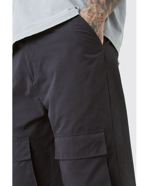 BoohooMAN Tall Fixed Waist Relaxed Peach Flare Cargo Trouser in Black für Herren