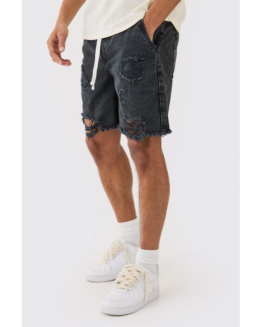 Boohoo Relaxed Rigid Elasticated Waist Ripped Denim Short In Washed Black