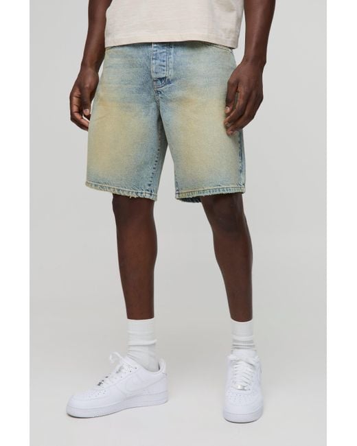 Pantalón Corto Vaquero Holgado Con Lavado A La Piedra Y Bajo Sin Acabar Boohoo de color Blue